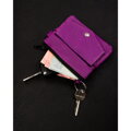 Kluczówka ze skóry naturalnej w fioletowym kolorze zamykana na zatrzask i suwak