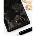 Duży, pionowy portfel damski w czarnym kolorze zamykany na magnes i suwak - Peterson