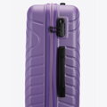 Średnia walizka z ABS-u z geometrycznym tłoczeniem fioletowa 56-3A-752-25